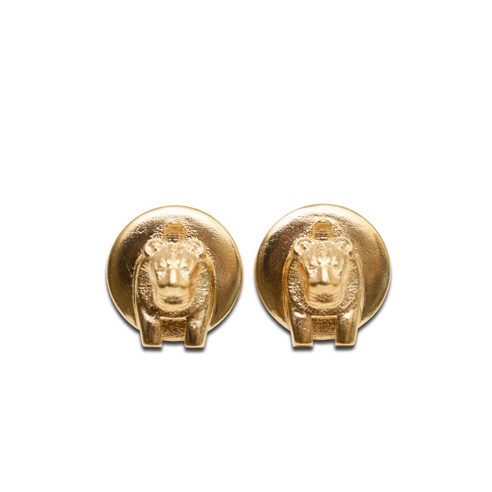 4. Studio image of Sekhmet Fire Stud Earrings in gold-plated silver, highlighting design and texture