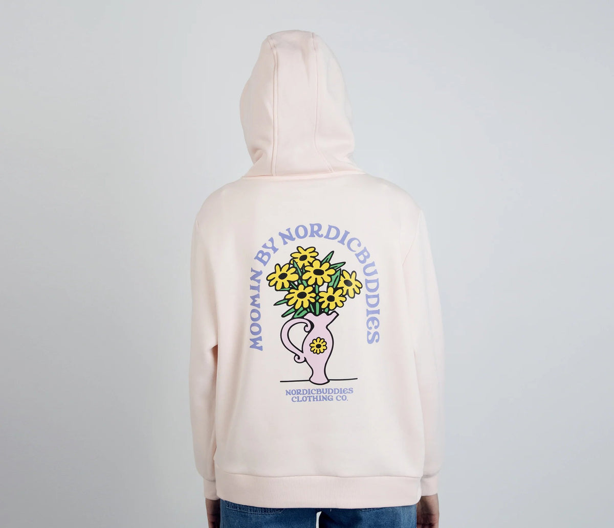 2. Back view of women's light pink Sniff Flower Bouquet Hoodie by Moomin, worn by model in studio