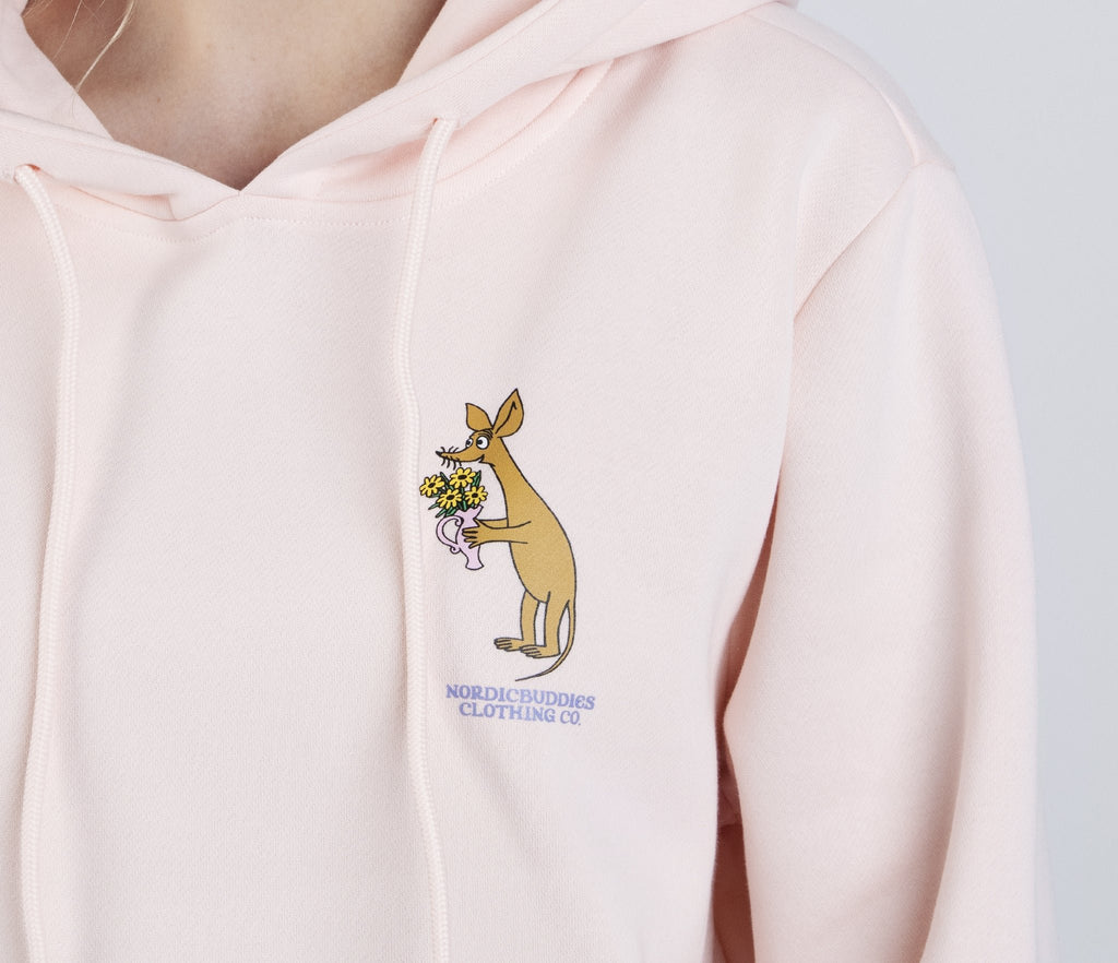 3. Close-up of Sniff character holding flowers on light pink Moomin hoodie