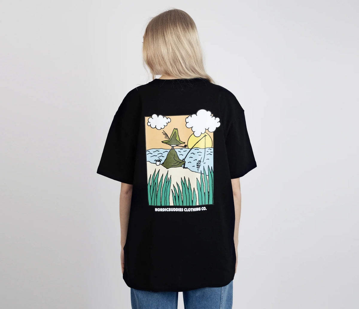 5. Women's Snufkin Fishing T-Shirt by Moomin, back view with colorful graphic, studio setting