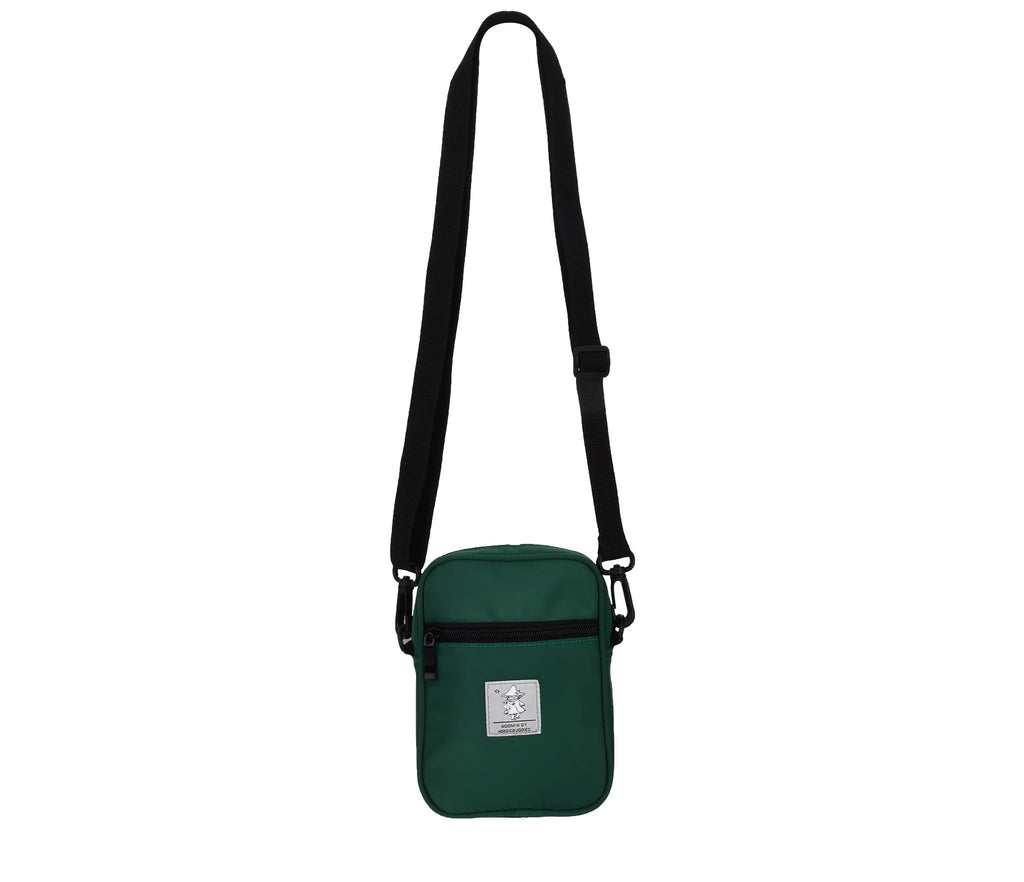 2. Full view of green Snufkin Neck Bag Urban by Moomin with adjustable strap, studio setting