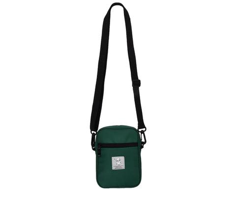 2. Full view of green Snufkin Neck Bag Urban by Moomin with adjustable strap, studio setting
