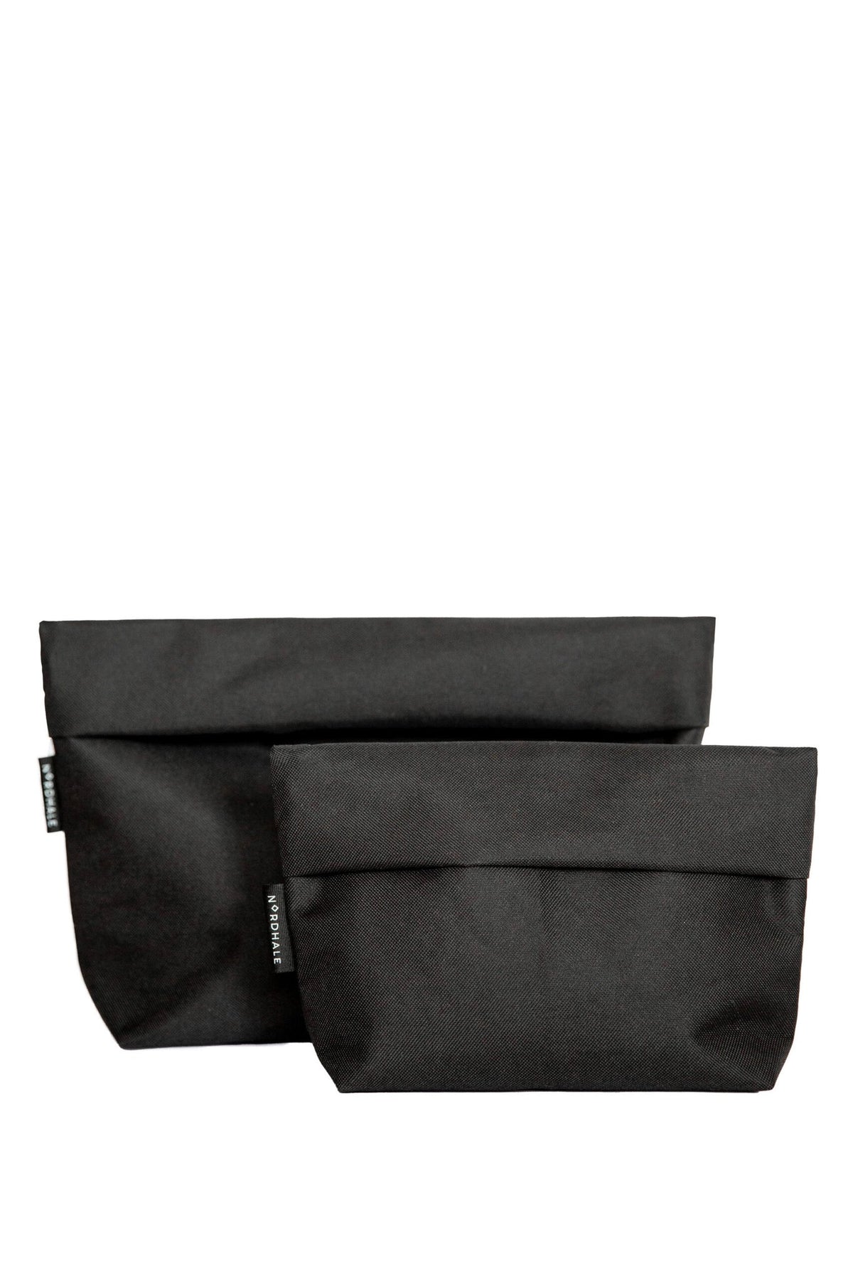 2. Studio image of Nordhale NES Toiletry Bags in two sizes, black color, side by side