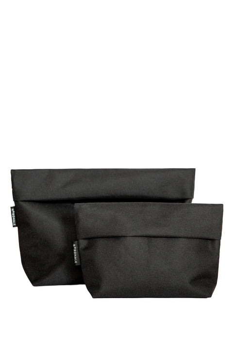 2. Studio image of Nordhale NES Toiletry Bags in two sizes, black color, side by side
