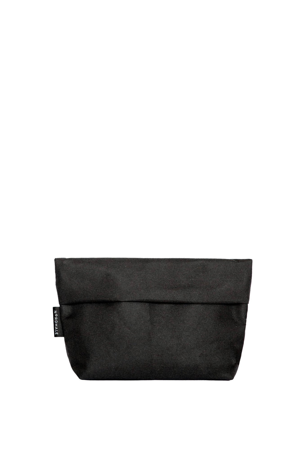 5. Nordhale NES Toiletry Bag in black, shown in studio with minimalist style