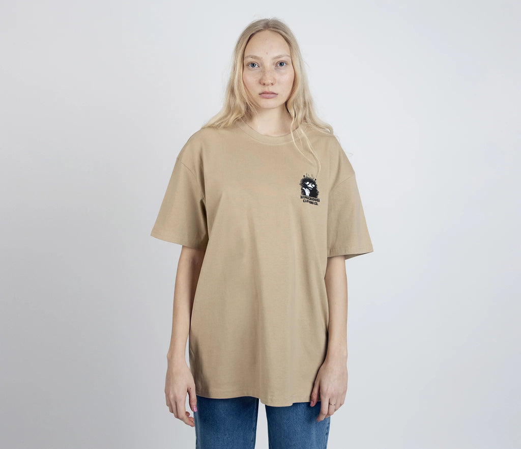 8. Women's unisex Stinky Plotting T-Shirt by Moomin, front view with small logo in studio