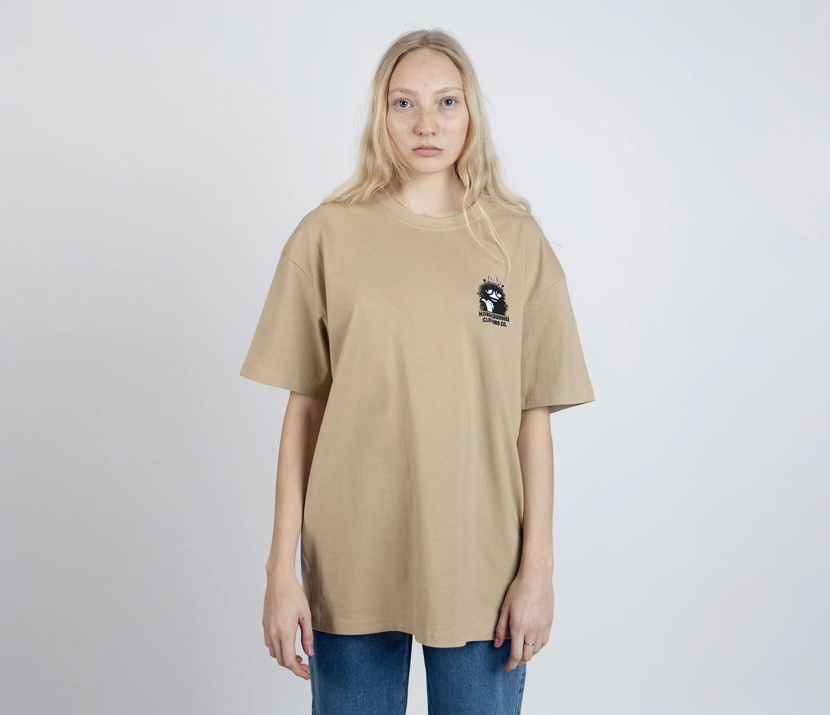 8. Women's unisex Stinky Plotting T-Shirt by Moomin, front view with small logo in studio