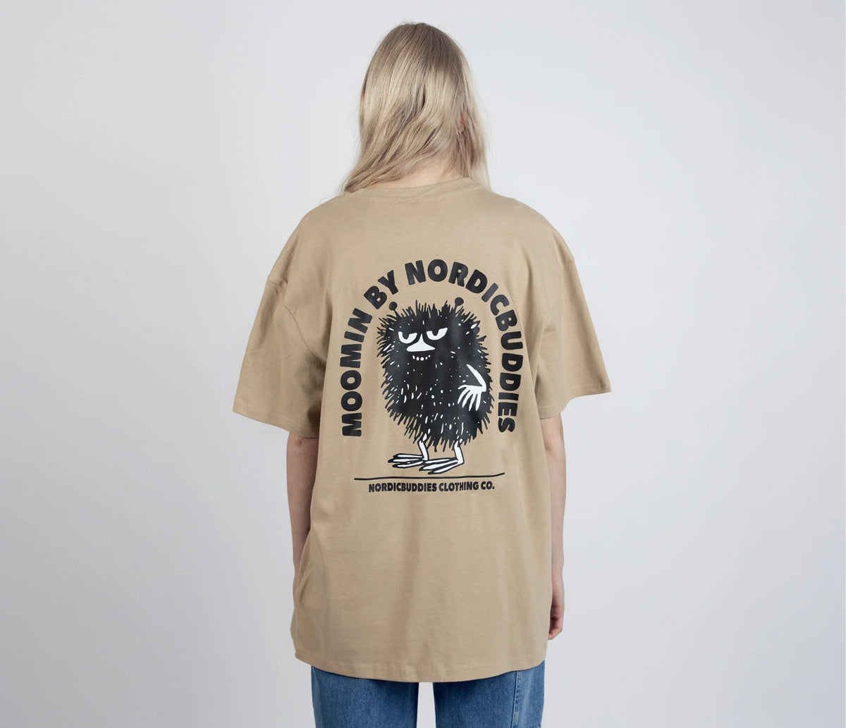 4. Women's unisex Stinky Plotting T-Shirt by Moomin, back view with NordicBuddies logo in studio