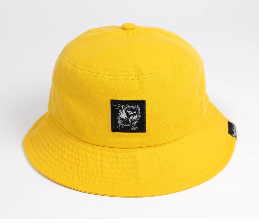 4. Close-up of Moomin character patch on yellow Stinky Bucket Hat