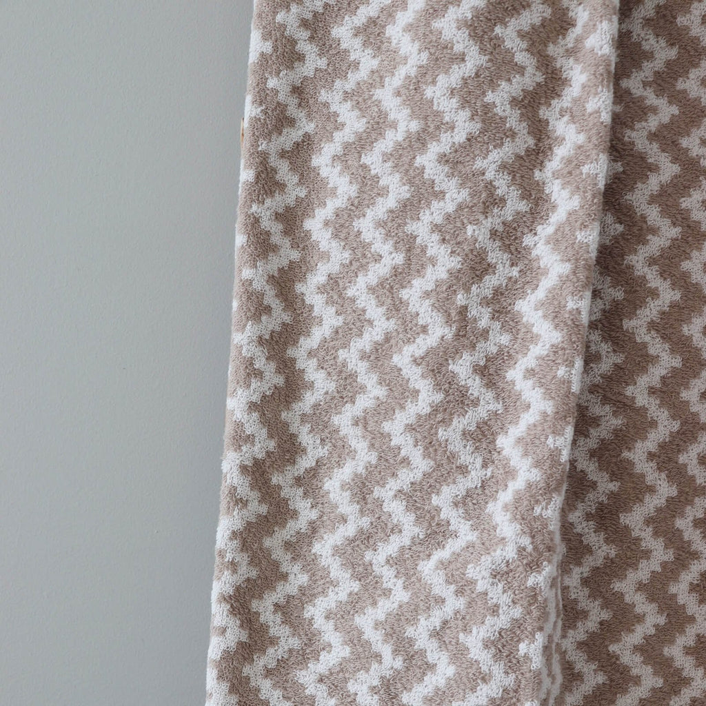 3. Close-up of beige and white terry fabric showing Tartu County mitten pattern texture