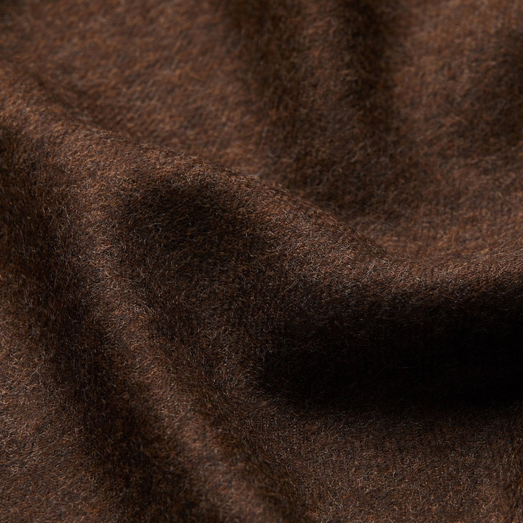 21. Close-up of dark brown Alpaka baby alpaca wool fabric texture