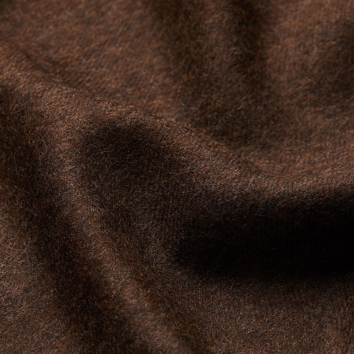21. Close-up of dark brown Alpaka baby alpaca wool fabric texture