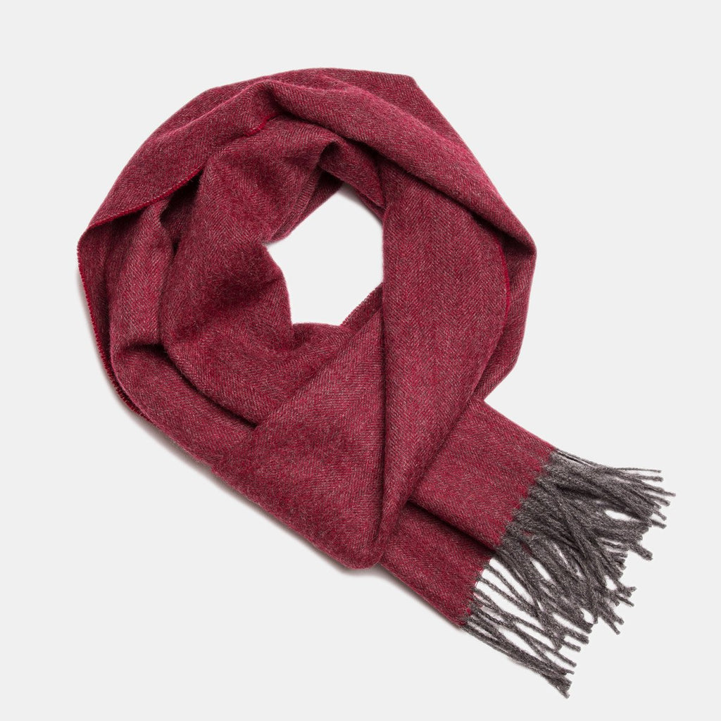 11. Studio image of Alpaka natural baby alpaca wool scarf in red with fringe detail