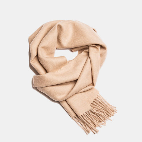 2. Beige Alpaka baby alpaca wool scarf with fringe detail in flat lay