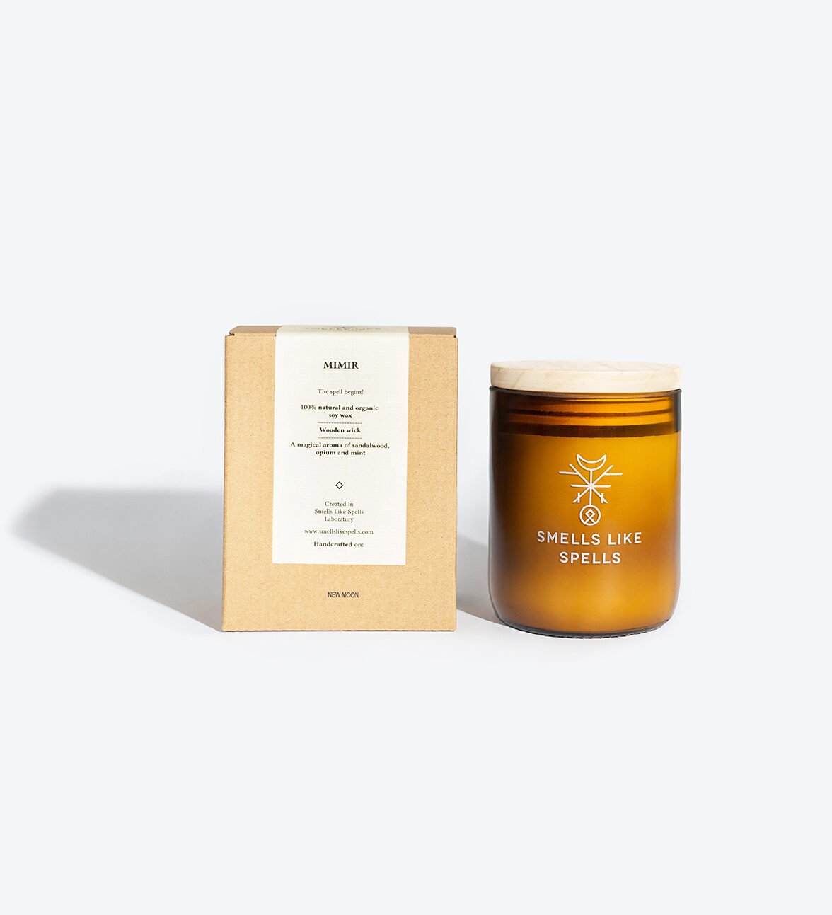 2. Smells Like Spells MIMIR scented candle in amber glass jar with packaging, featuring wooden lid