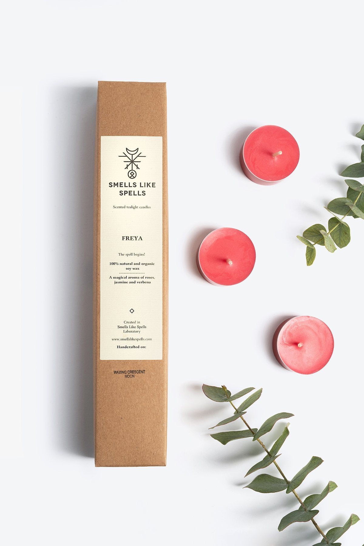 1. Smells Like Spells FREYA scented tealight candles with packaging, shown with eucalyptus leaves