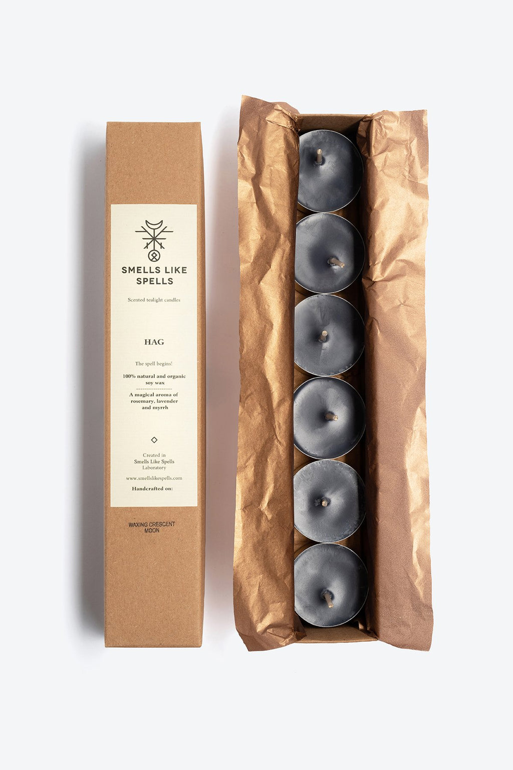 2. Smells Like Spells Scented Tealight Candles HAG in open packaging, showcasing six soy wax candles wrapped in paper