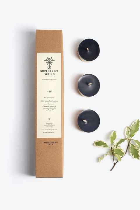 3. Smells Like Spells Scented Tealight Candles HAG with soy wax and essential oils, displayed with packaging and three candles, lifestyle setting