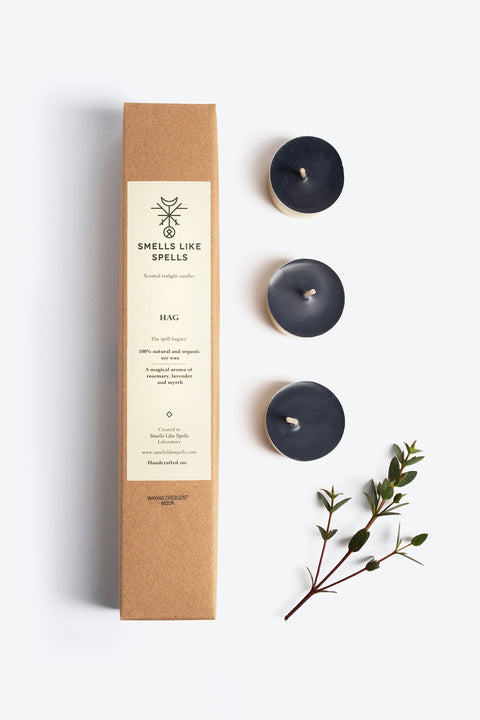 1. Smells Like Spells Scented Tealight Candles HAG with soy wax and essential oils, shown with packaging and three candles, lifestyle setting