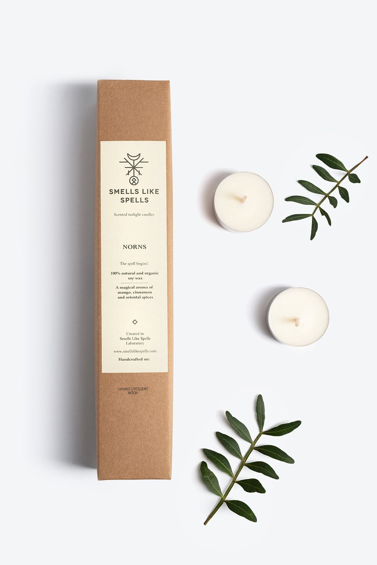 2. Smells Like Spells Scented Tealight Candles NORNS in soy wax, displayed with packaging and decorative leaves