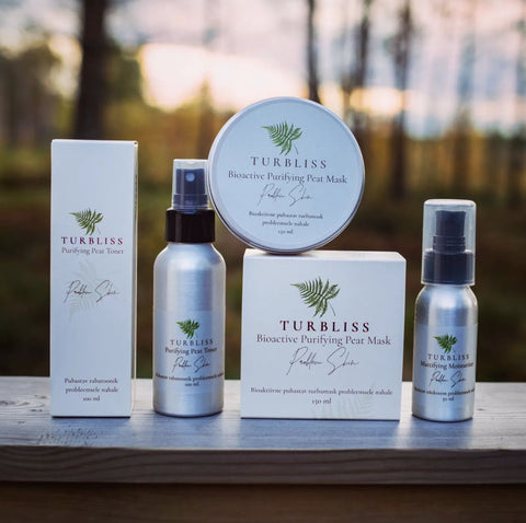 3. Turbliss skincare collection including Matte Face Cream, Peat Mask, and Toner displayed outdoors