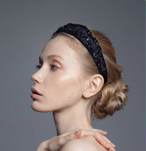 4. Side view of woman wearing Eva Oherjus Mulberry Silk Beaded Headband Hestia, emphasizing luxurious Mulberry silk and beadwork