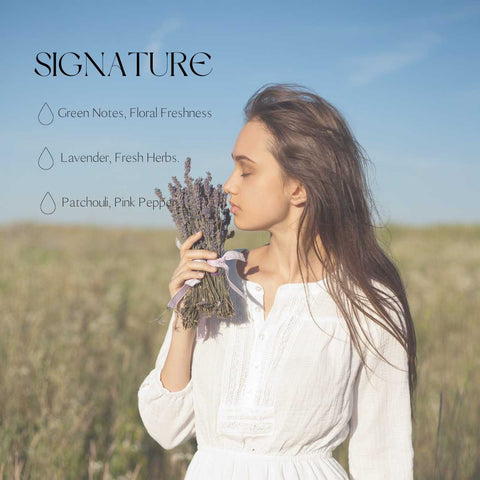 1. Woman in a field holding lavender, representing the floral freshness of Candledust Signature car diffuser