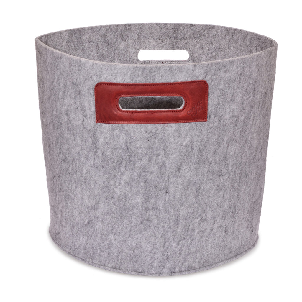 2. Studio shot of grey Felt Omaking Basket with bordeaux leather handle details, highlighting sturdy felt construction