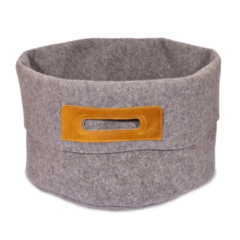 1. Omaking grey wool felt basket with cognac leather handle, showcasing sturdy design and generous capacity, studio shot