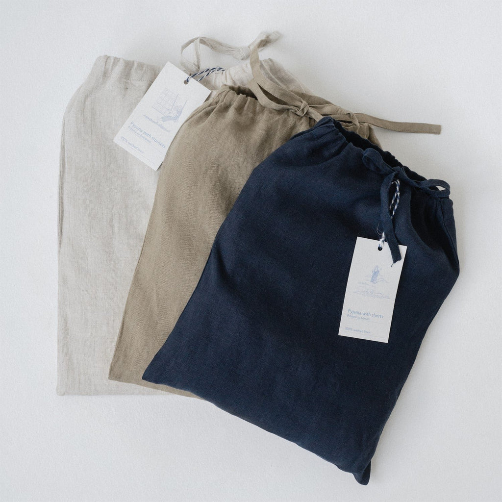 5. Three linen bags in beige, khaki, and navy with tags, laid flat