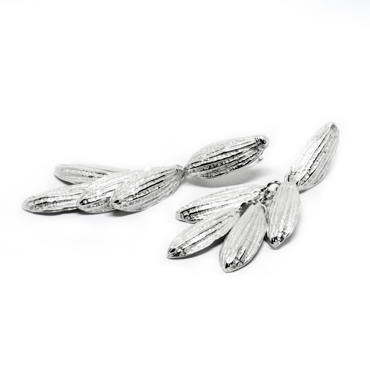 1. Close-up of Agnes Veski Jewellery Spring 2 earrings in 925 silver, inspired by nature, shown in a studio setting