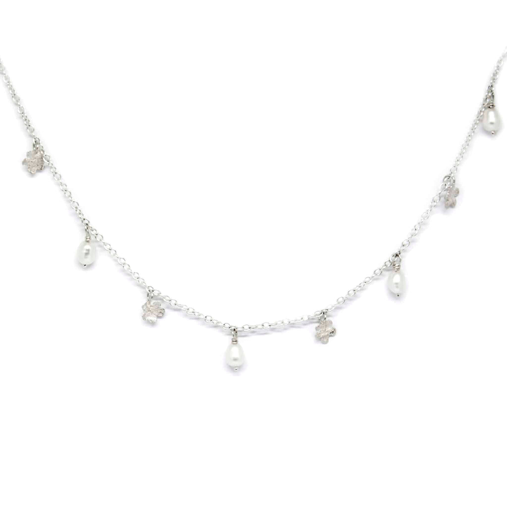 3. Flat lay of SPRING Myosotis Necklace with pearls and silver chain by Agnes Veski Jewellery