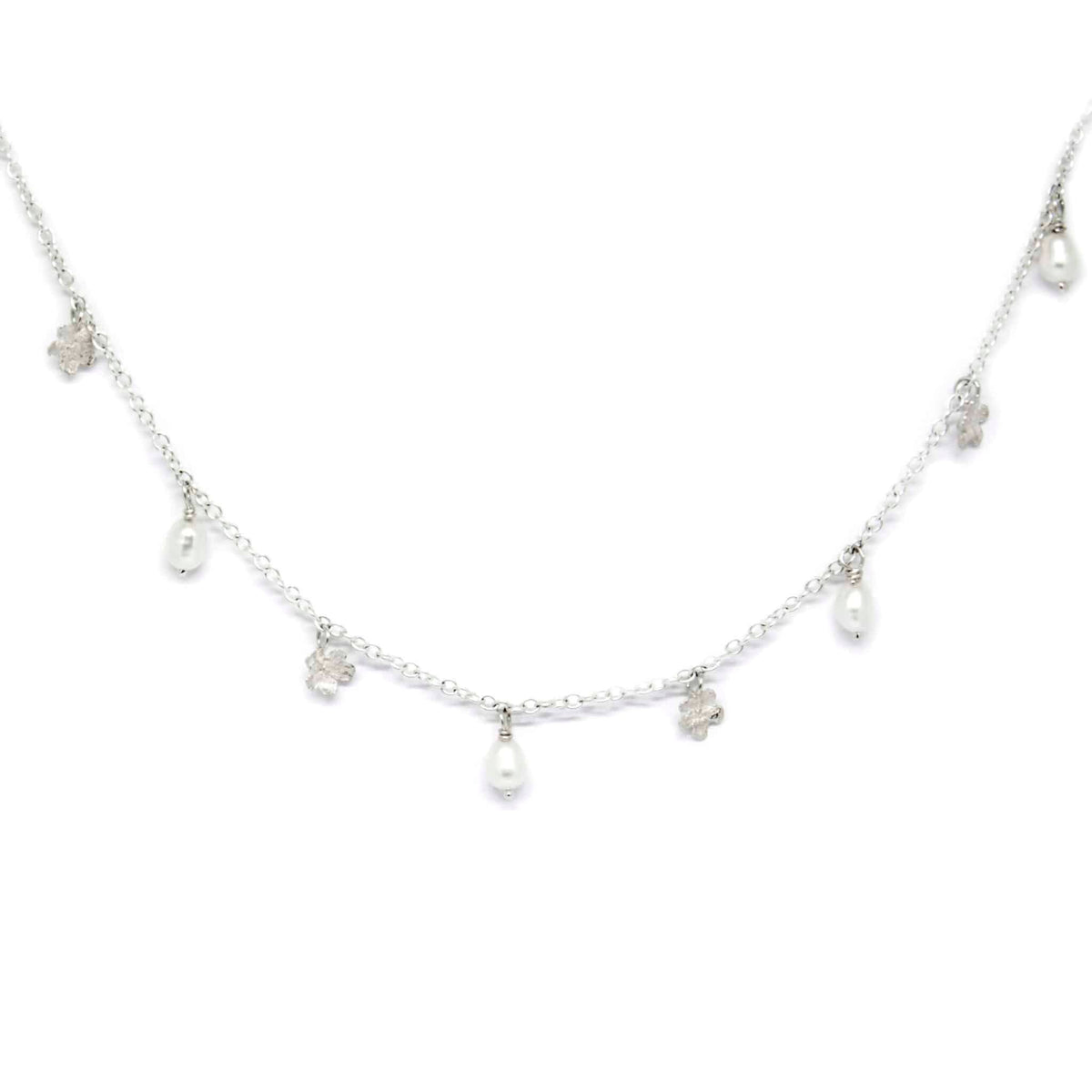 3. Flat lay of SPRING Myosotis Necklace with pearls and silver chain by Agnes Veski Jewellery