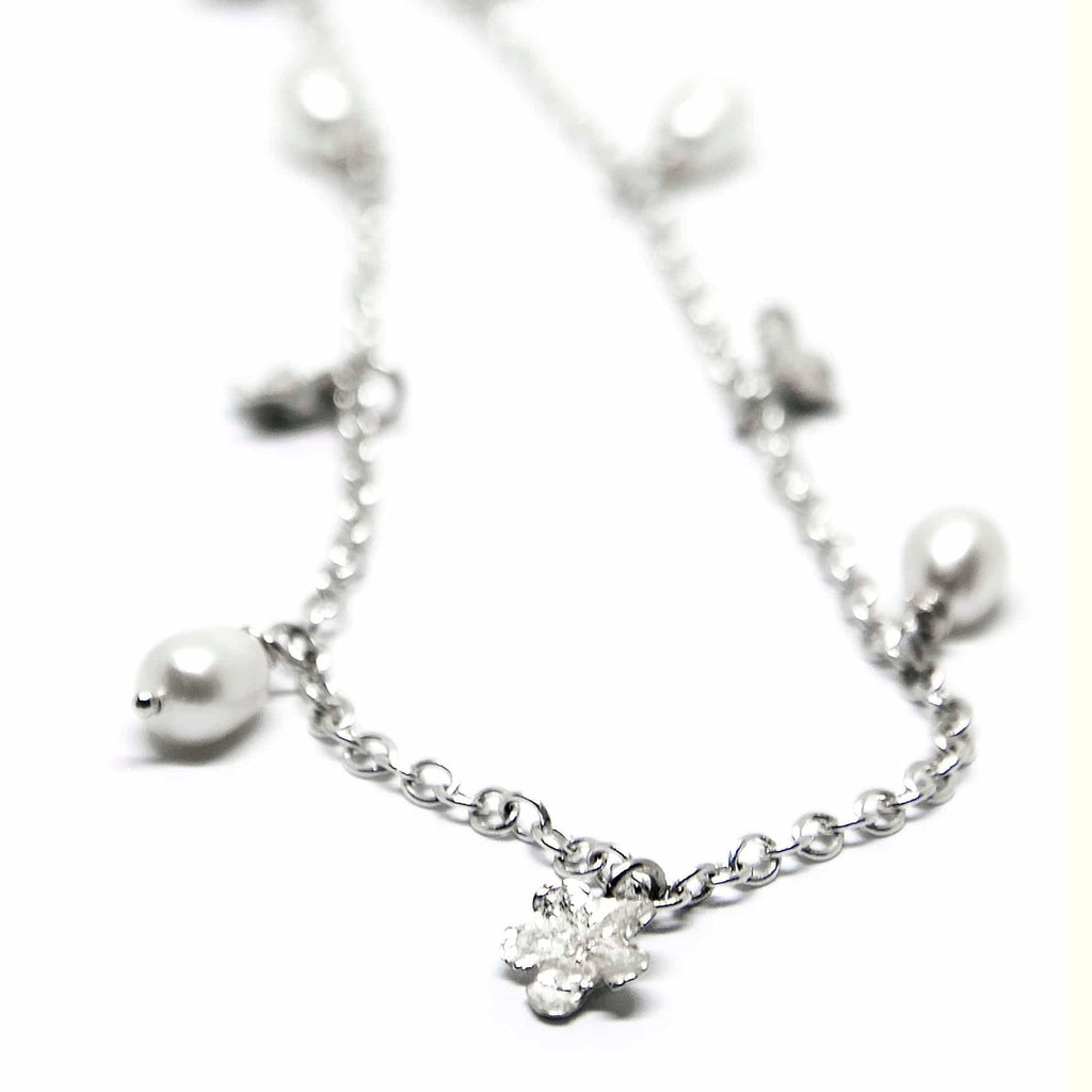 1. Close-up of Agnes Veski Jewellery SPRING Myosotis Necklace with pearls and silver chain