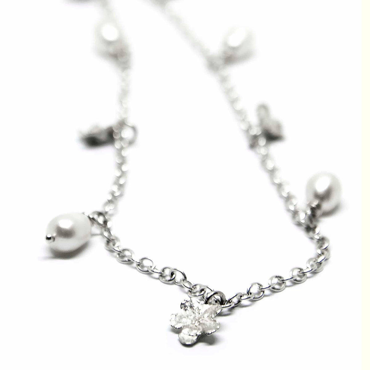 1. Close-up of Agnes Veski Jewellery SPRING Myosotis Necklace with pearls and silver chain
