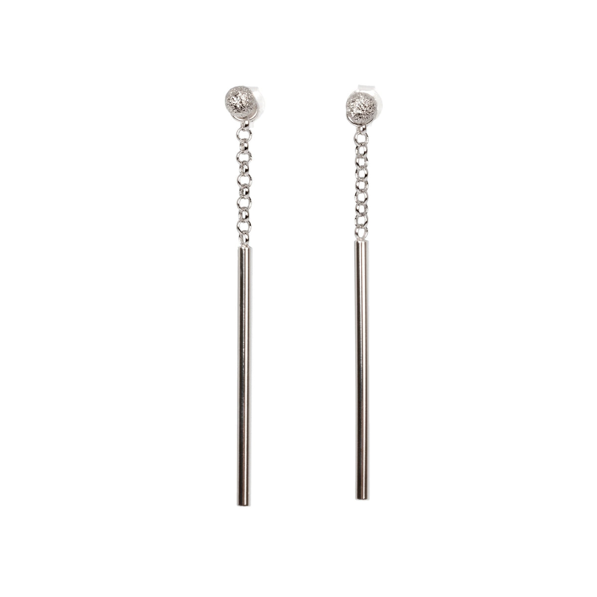 3. Studio image of MyaMoon Stardust Falling Earrings in silver with long drop and chain pendant