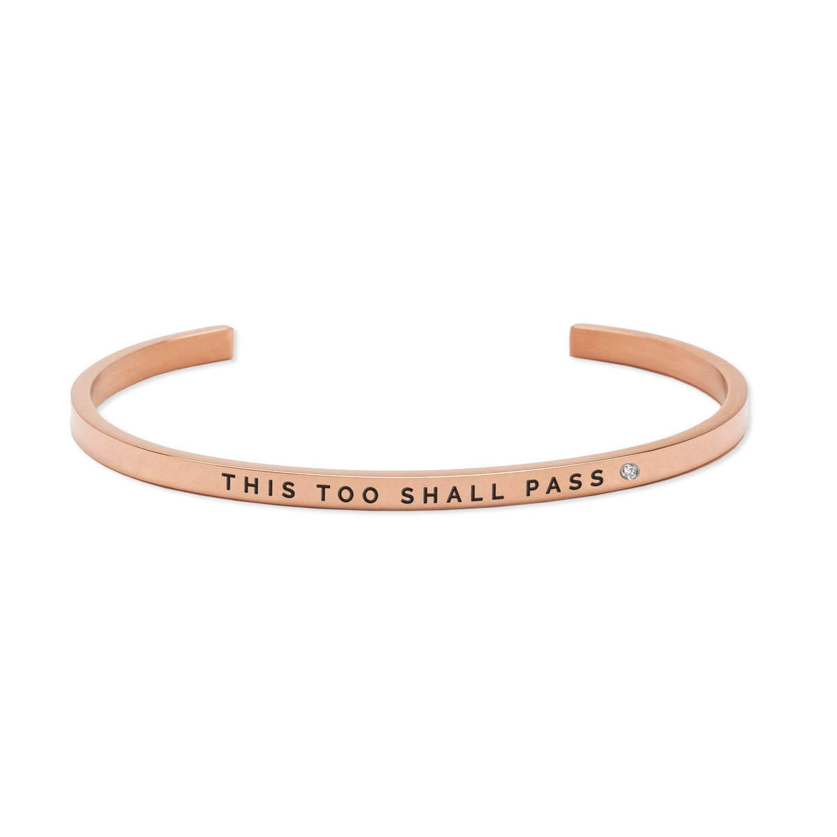 3. Olla's 'This Too Shall Pass' bracelet in rose gold, showcasing engraved message and sleek finish