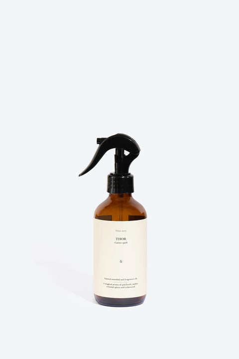 2. Smells Like Spells Perfumed Home Spray THOR in amber bottle, minimalist studio shot