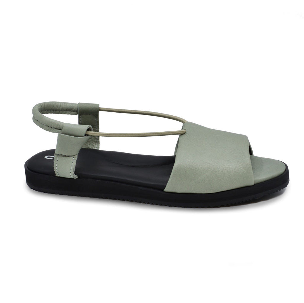 6. Side view of a single green Berlin sandal by Omaking, featuring a leather upper and EVA rubber outsole