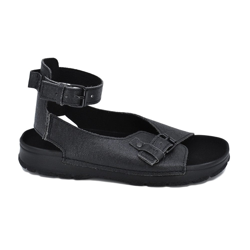 4. Studio image of black TOKU Athens Vegan Sandals with closed heel and adjustable ankle strap
