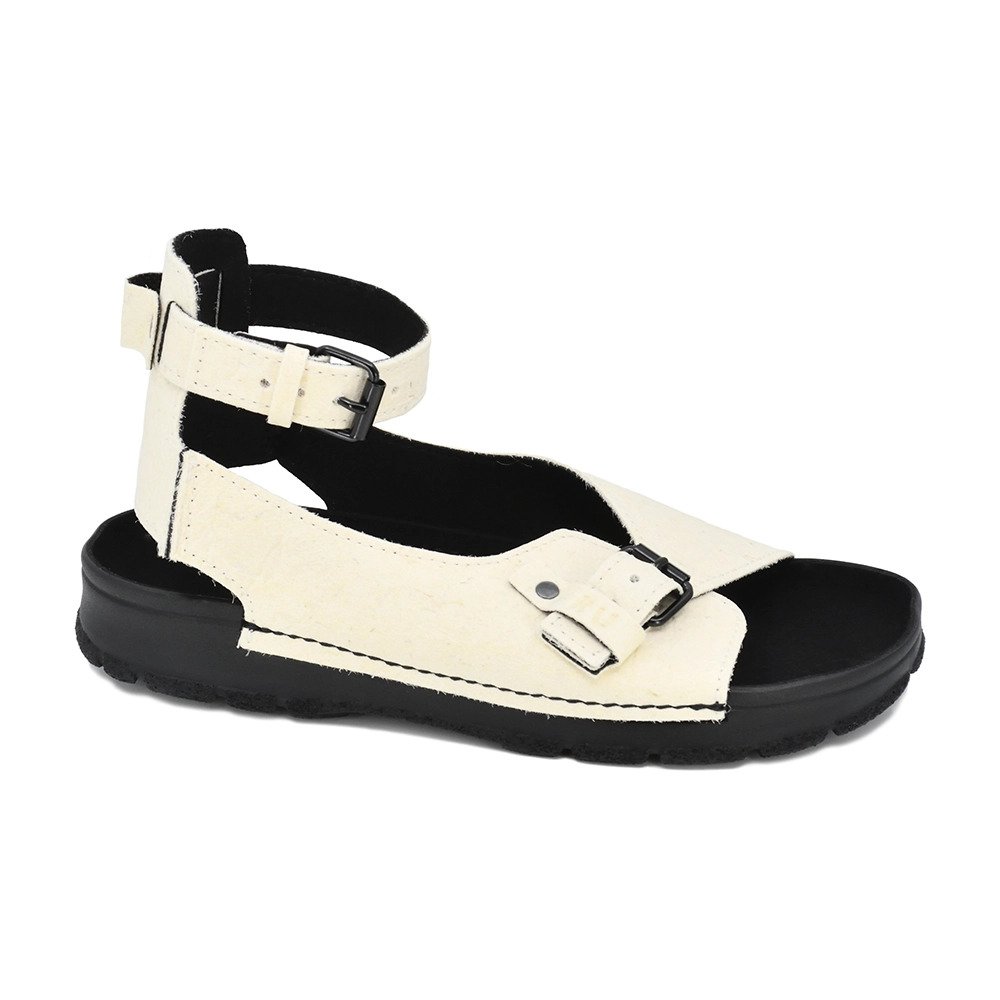 4. Side view of TOKU Athens Vegan Sandals in white, featuring durable PU outsole and handcrafted design