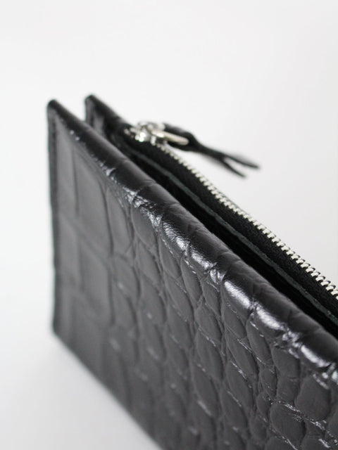 2. Close-up of Classic Leather Wallet TAAL in Black Croco, highlighting zippered section and crocodile texture