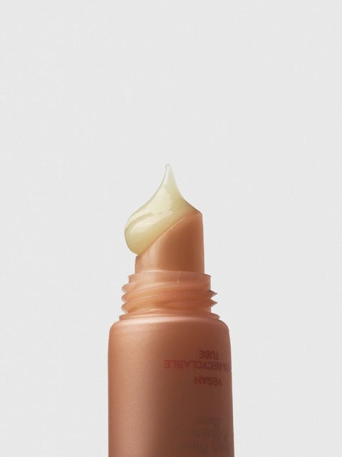 3. Close-up of Magrada Organic Cosmetics Tinted Lip Balm Peach applicator, highlighting creamy texture