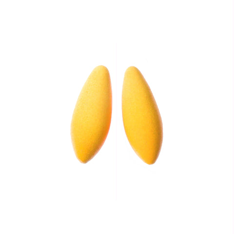 2. Studio shot of Tanel Veenre Mini Bananas Earrings in bright yellow with a unique velvety coating, made from wood and silver, shown on a white background.