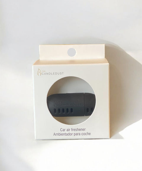 5. Candledust Champagne Rhubarb car diffuser in packaging, highlighting product branding and design