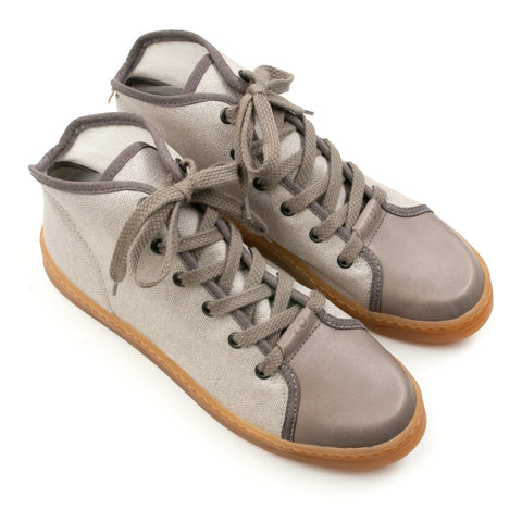 2. Studio shot of grey TOKU Stockholm Sneakers by Omaking, showing high-cut design and natural latex rubber sole