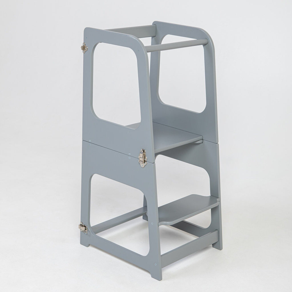 16. Grey transformable kitchen tower in step stool configuration on white background
