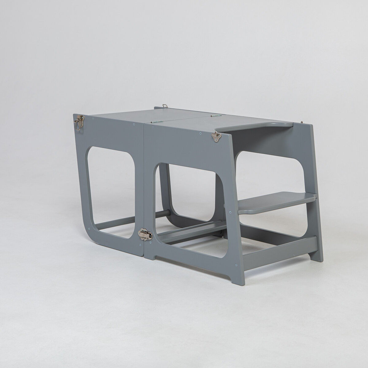 15. Grey transformable kitchen tower in table configuration on white background