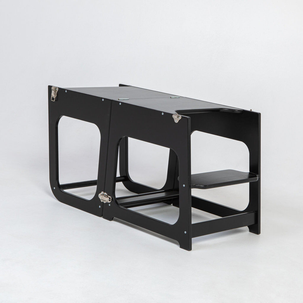 7. Black transformable kitchen tower in table configuration on white background