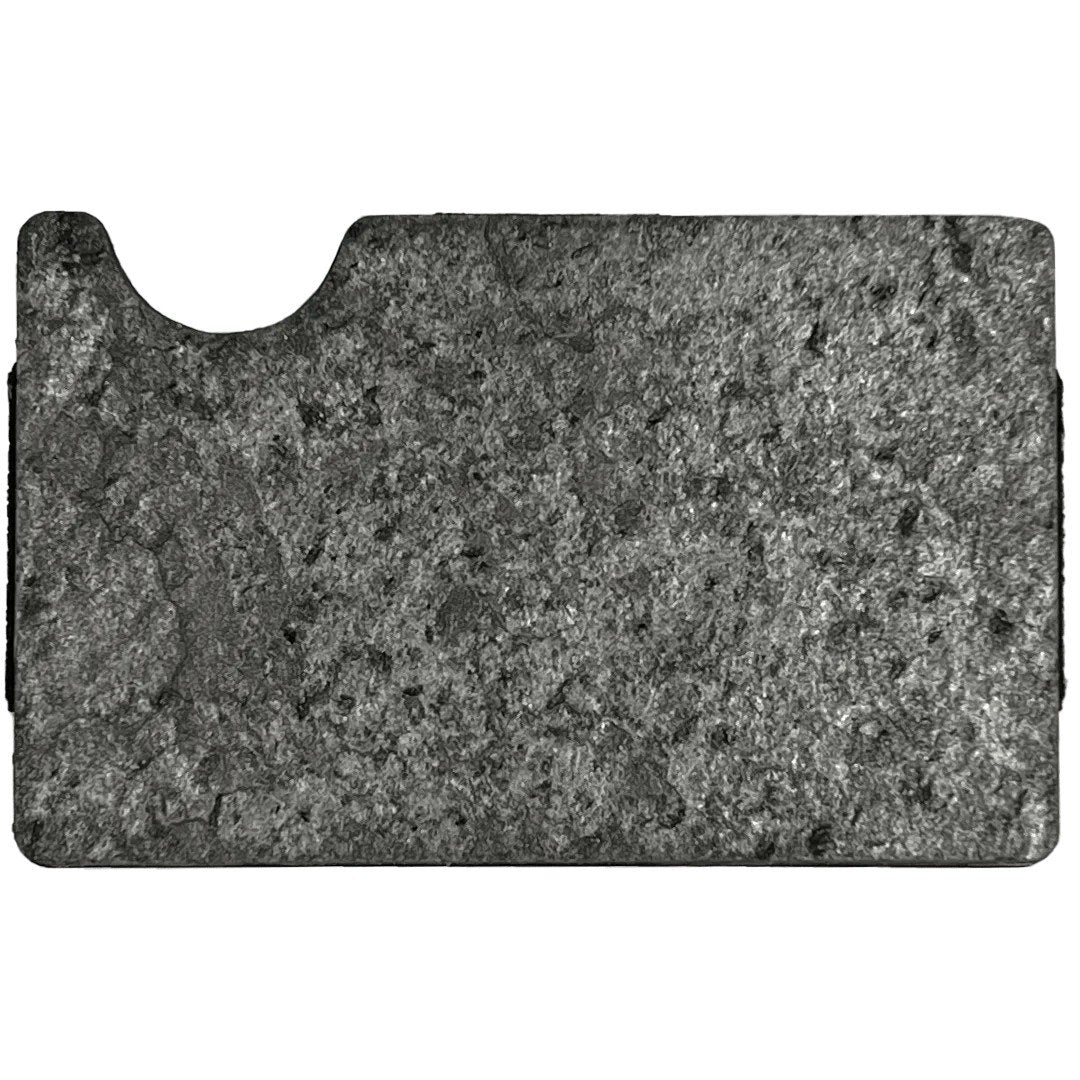6. Flat lay of Tume Kask cardholder displaying natural slate stone surface